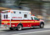 Burn Hazard Lurks in THIS Budget Appliance?! Red and white ambulance driving on a city street.