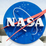 NEW: NASA Picks The Four NASA logo displayed prominently against a blue background
