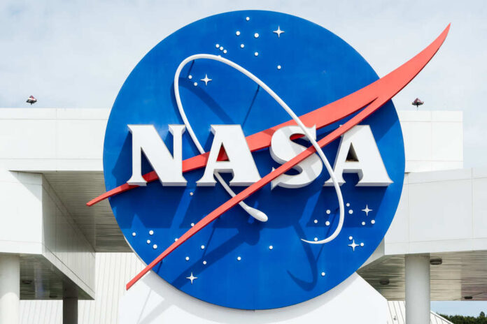 Kennedy,Space,Centerthe,,United,States,-,Sep,22,,2014:,One NASA logo displayed prominently against a blue background