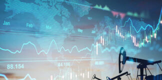 Oil pumps and financial charts against world map