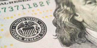 Close-up of U.S. banknote with Federal Reserve seal and portrait detail
