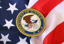 Mystery DOJ Probe Engulfs Lib Governor Department of Justice seal on American flag.