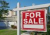 Congress vs Wall Street Homes A 'For Sale' sign in front of a house