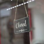 Business Bloodbath: 175 Stores On The Chopping Block A closed sign hanging on a shop window