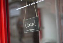 Business Bloodbath: 175 Stores On The Chopping Block A closed sign hanging on a shop window
