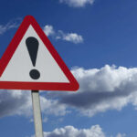 VIDEO: Deadly Midair Horror Caught On Camera Warning sign with exclamation mark against sky