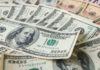 Fox’s $22B Power Grab Announced Stacks of various U.S. dollar bills.