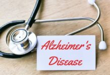 Blood Test Predicts Alzheimer’s — Decades Early A healthcare professional preparing a syringe from a vial