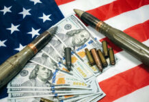 Pentagon Money Blaze Stuns Congress American flag with money bullets and weapons on top