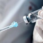 Ozempic’s Hidden Workplace Shock A healthcare professional preparing a syringe from a vial