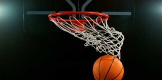 Basketball swishing through a hoop