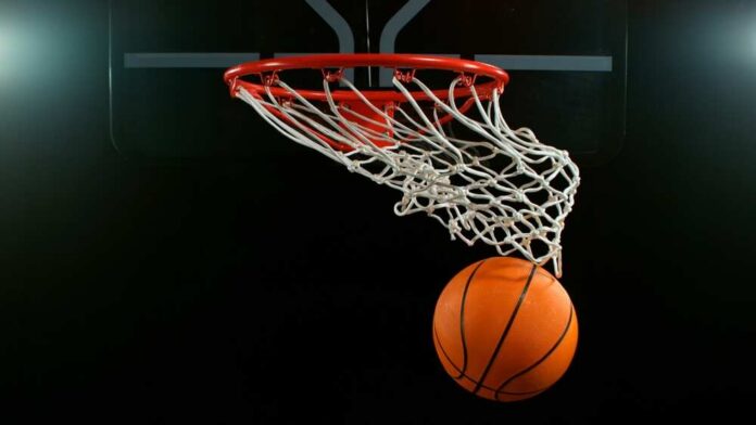 Basketball swishing through a hoop