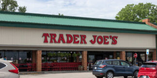 Recall notice over grocery store shelves.