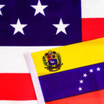 Trump Claims Venezuela Oil Control Flags of Venezuela and the United States displayed together