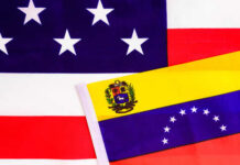 Trump Claims Venezuela Oil Control Flags of Venezuela and the United States displayed together