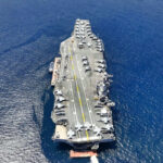 VIDEO: Cartel Boat Vaporized in U.S. Strike Aircraft carrier on open sea with parked planes