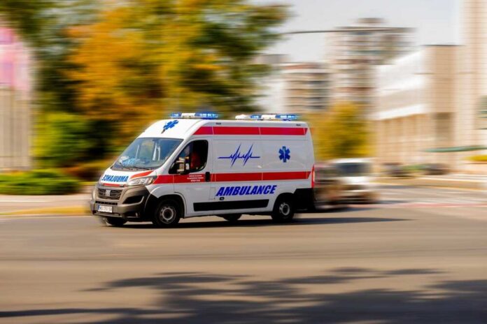 Novi,Sad,,Rs,-,Sep,23,,2024:,Ambulance,Lights,Flashing Ambulance van with flashing lights speeding through a city street