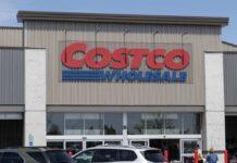 This BIG Comeback Cheers Costco Shoppers Exterior view of a Costco Wholesale store with a clear blue sky