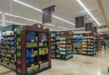Recall Flag Hits Walmart Favorite Interior view of a grocery store aisle with shelves of food and beverages