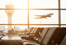 Airport Foot-Wash Plan Sparks Big Backlash View of an airport terminal with an airplane taking off in the background