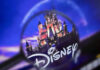 Disney Rocked With More BAD NEWS! Magnifying glass focusing on Disney castle logo.