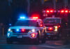 Teen Terror Trend Alarms Cops Police car and ambulance with flashing lights nighttime