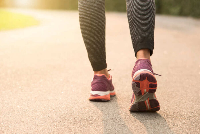 Young,Runner,Women,Jogging,At,Road,With,Sunset,Background.,Healthy