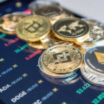 Cryptocurrency coins on digital trading screen