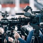 Ground Zero Files Drop — What Was Hidden? Broadcast cameras on tripods at a press event
