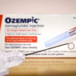 Unapproved Weight-Loss Shots Flood Market Ozempic injection pen with a droplet at the needle tip