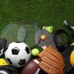 Senate Smacks College Sports – Demands THIS!? Variety of sports equipment arranged on green grass