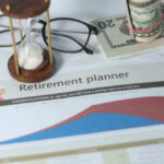 Retirement’s Sneaky Brain Tax Explained Retirement planner graph with money glasses hourglass