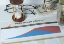 Retirement’s Sneaky Brain Tax Explained Retirement planner graph with money glasses hourglass