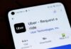 Uber Slammed With $40M Bombshell Smartphone screen showing Uber app listing in app store