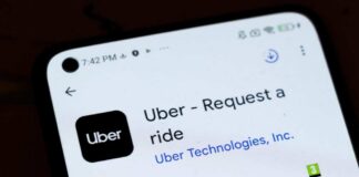 Smartphone screen showing Uber app listing in app store