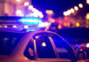 VIDEO: Attic Horror Revealed – Shocks Cops Police car with flashing blue lights at night.