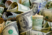 Cash Envelopes Inside The White House? Rolled U.S. dollar bills in various denominations.