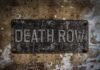 Death Row Deal Outrages Conservatives Weathered metal sign reading 'DEATH ROW' on a wall