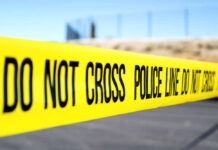 HORROR: Cartel Graves Exposed Police do not cross tape stretched across an outdoor scene