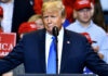 Trump Ally’s Flattery Triggers Backlash A man in a suit speaking at a rally.