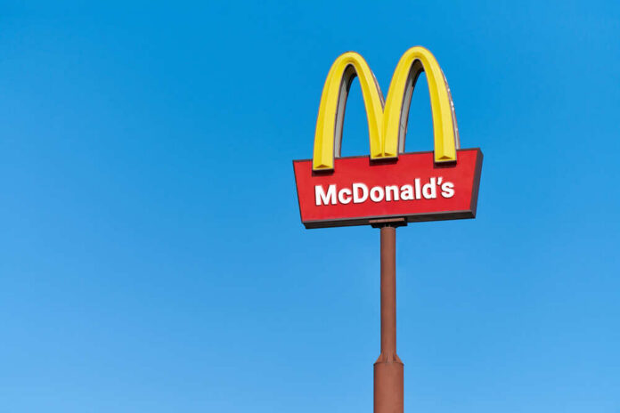 Moscow,,25.08.2019,-,Mcdonalds,Roadside,Cafe,Logo,,Copy,Space.,Mcdonald McDonald's restaurant sign against a clear blue sky