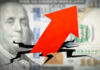 Fast-Food Giant Hits Billion-Dollar Milestone Red arrow on cracked $100 bill.