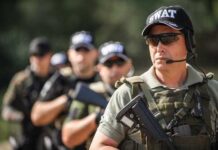 SWAT team members in tactical gear during a training exercise