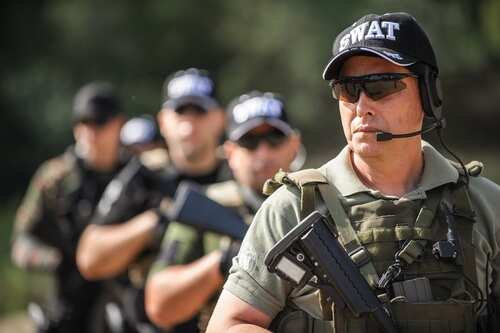 Group,Of,Full,Armed,Swat,Special,Forces,Army,Soldiers,In SWAT team members in tactical gear during a training exercise