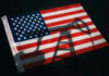 Trump Teases Drilling – Then Reality Hits American flag with oil pump shadow overlay.