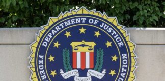 FBI seal featuring stars and laurel leaves