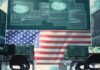 Shock: AI Now Fuels Most Attacks A high-tech workspace featuring multiple computer monitors displaying data and an American flag in the background