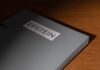 Trump Hit With Epstein Bomb Close-up of a metallic binder labeled 'EPSTEIN'