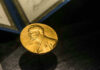 Nobel Prize medal featuring Alfred Nobels profile.