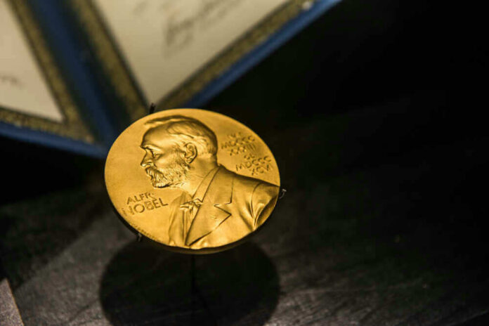 shutterstock_344487542 Nobel Prize medal featuring Alfred Nobels profile.